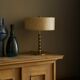 "Faux Bamboo" table lamp in patinated brass from the 1960s.