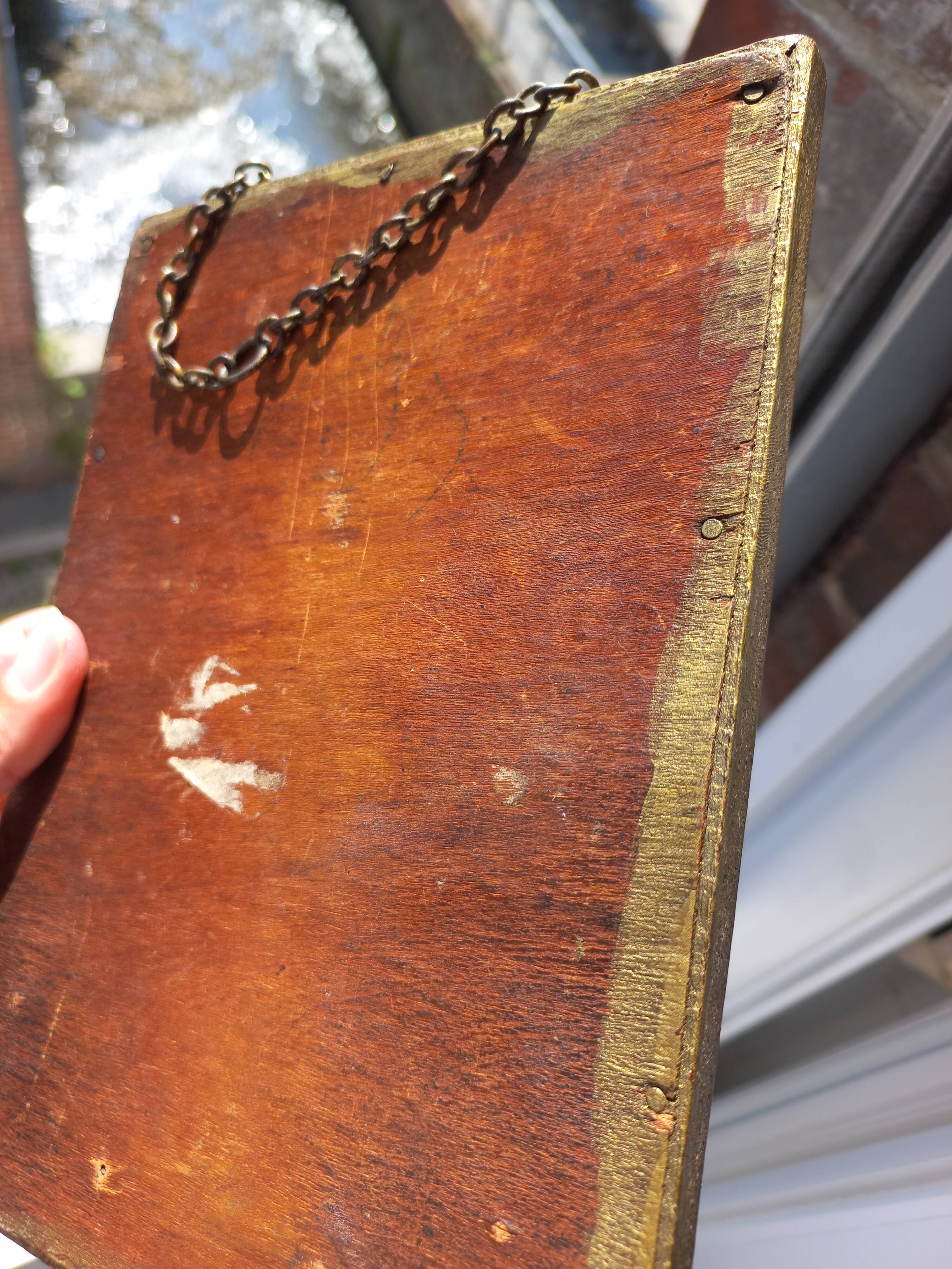 Small vintage mirror in gilded wood, bevelled glass with chain.