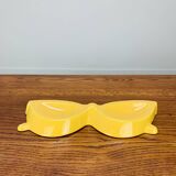 Vintage yellow ceramic glasses emptier