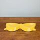 Vintage yellow ceramic glasses emptier