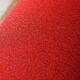 Pouf Ligne Roset, red tweed fabric, excellent condition.