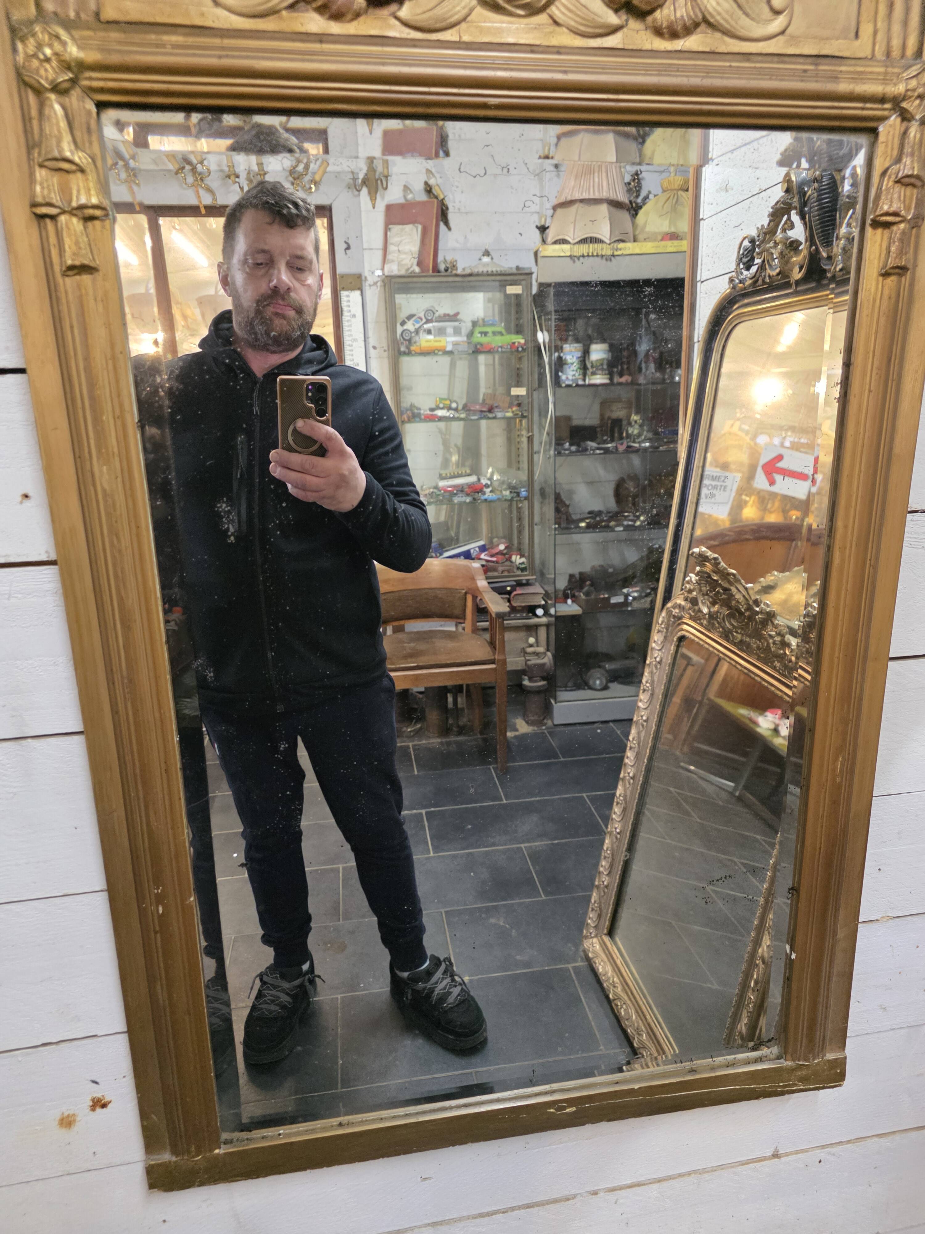 Art Deco gilded trumeau, bevelled mirror