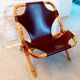 Vintage armchair in rattan and imitation leather 60s