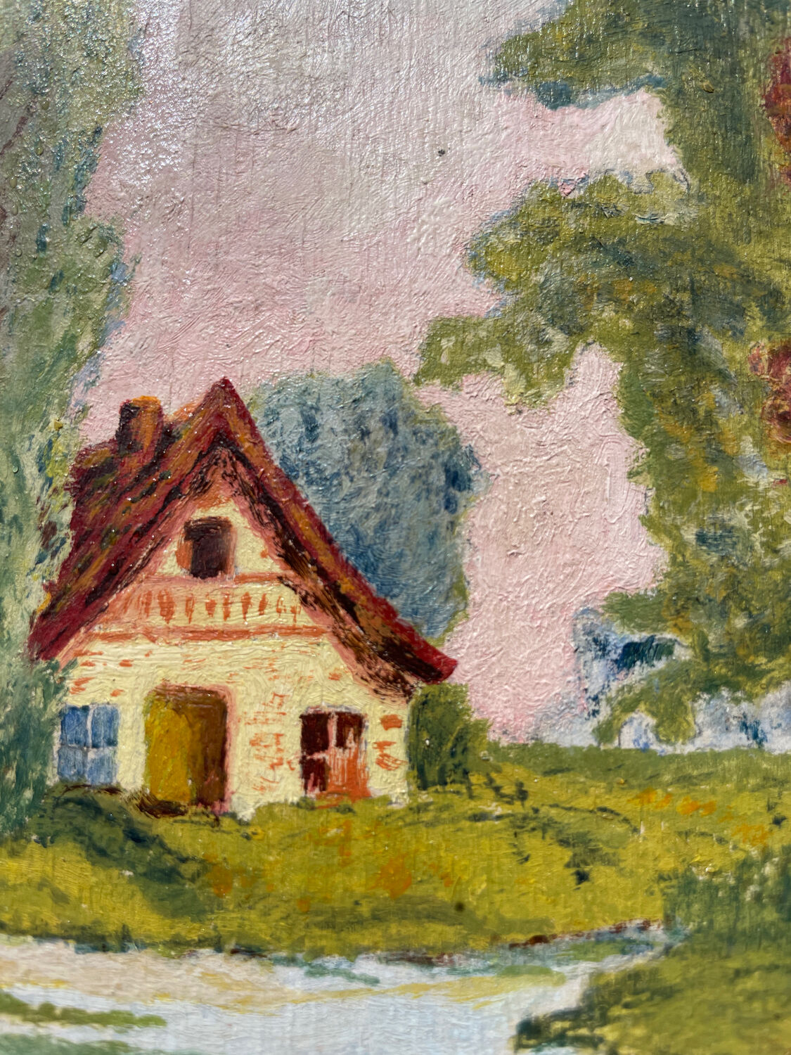 Small landscape painting with golden frame