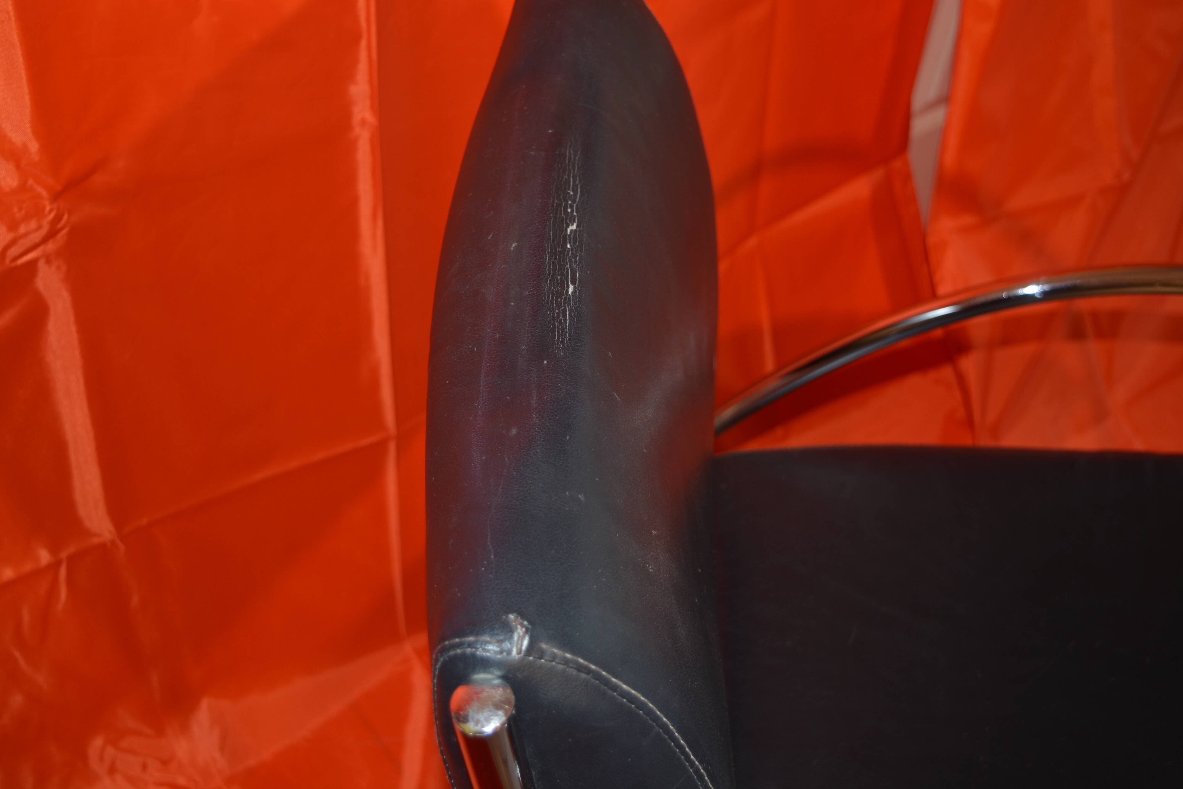 Vintage armchair in imitation leather and chrome steel tube