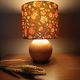 Table lamp with a wooden ball base, floral print in bohemian style.