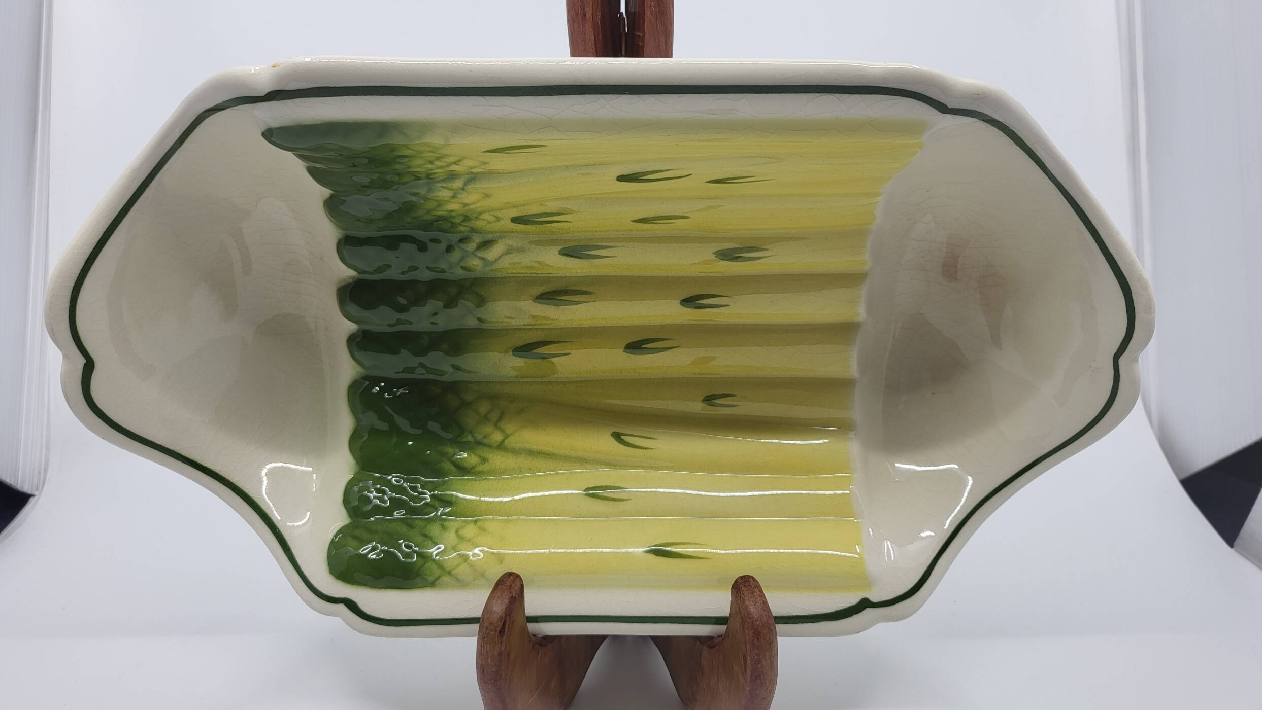 Salins earthenware slip dish decorated with asparagus, French, yellow and green, 20th century