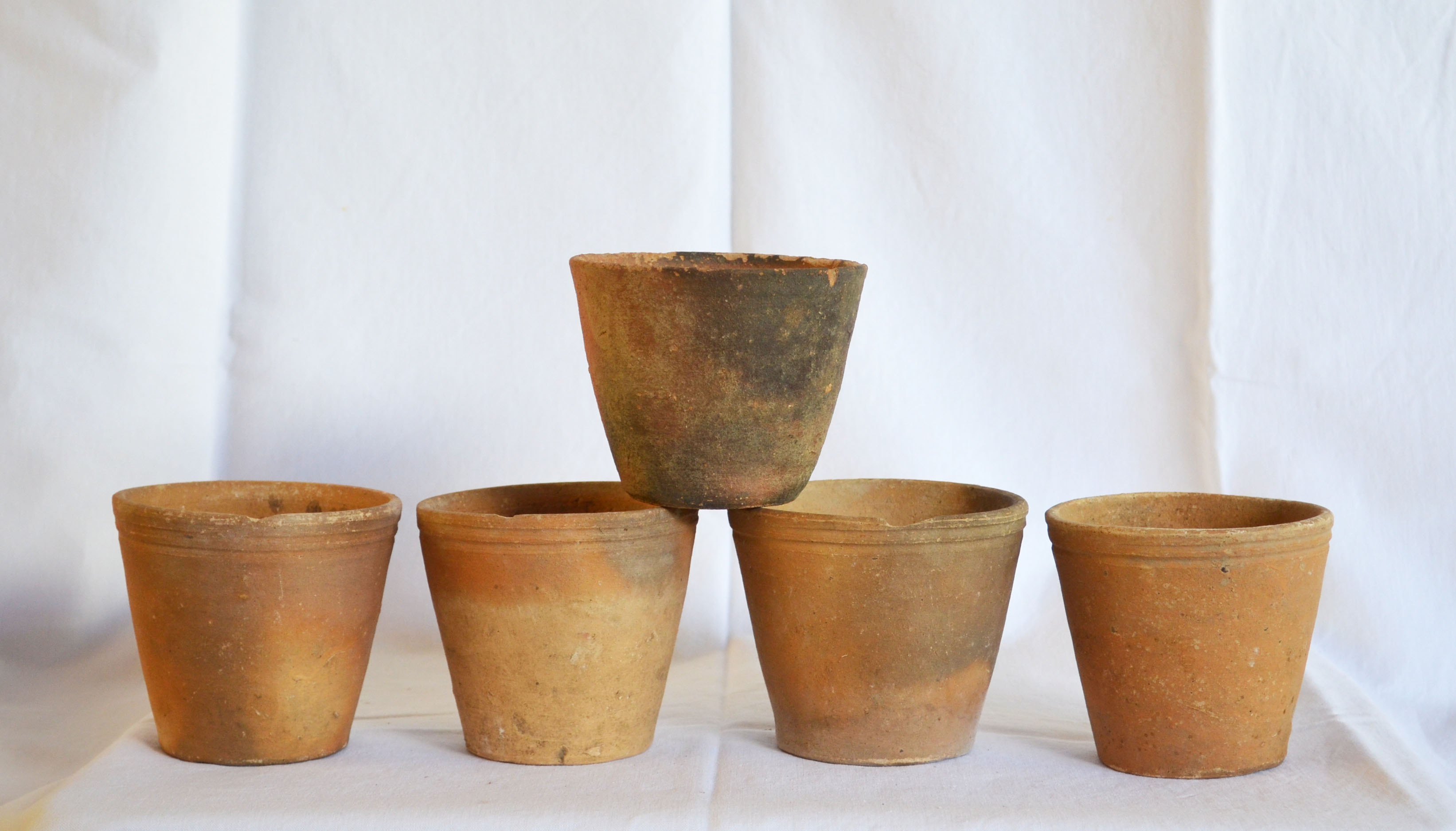5 old terracotta pots