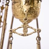Brass chandelier from the first half of the 20th century.