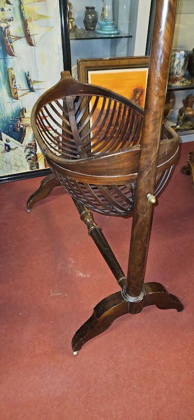 Empire style mahogany cradle with a swan neck, shaped like a cradle, circa 1810