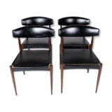 Set of four dining room chairs in rosewood and black leather of danish design from the 1960s.