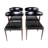 Set of four dining room chairs in rosewood and black leather of danish design from the 1960s.