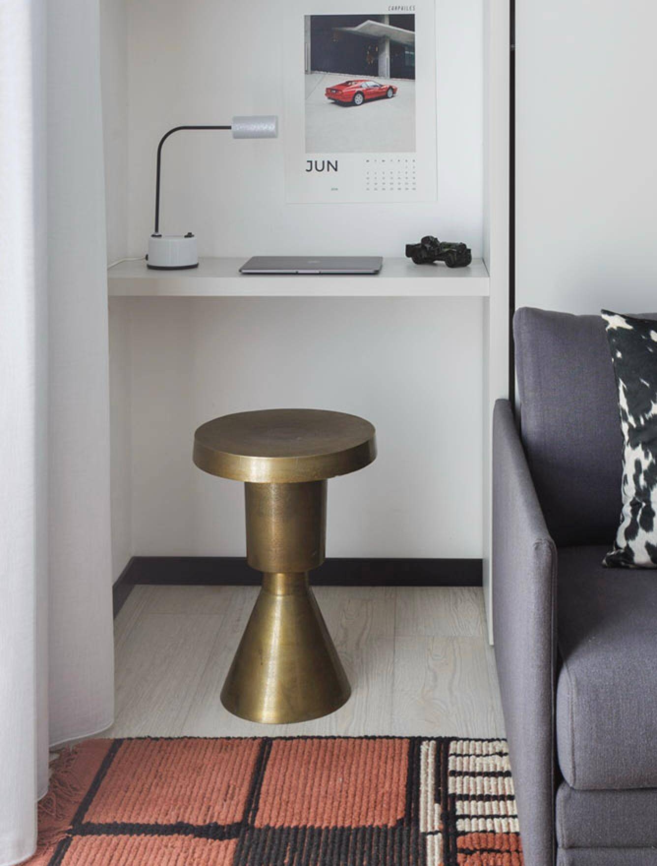 Sculptural metal side table, contemporary brassy side for modern interiors