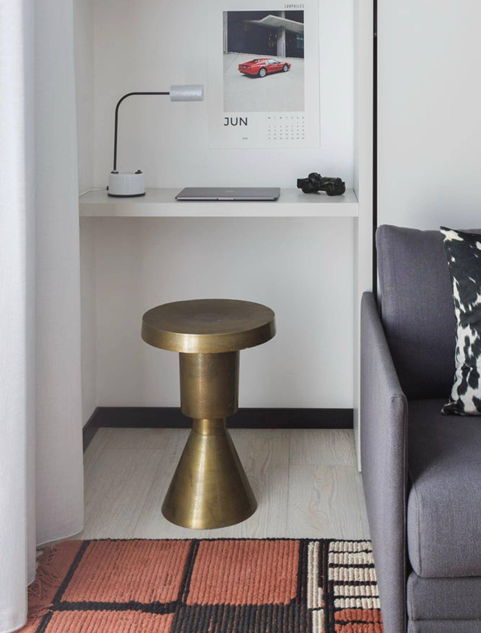 Sculptural metal side table, contemporary brassy side for modern interiors