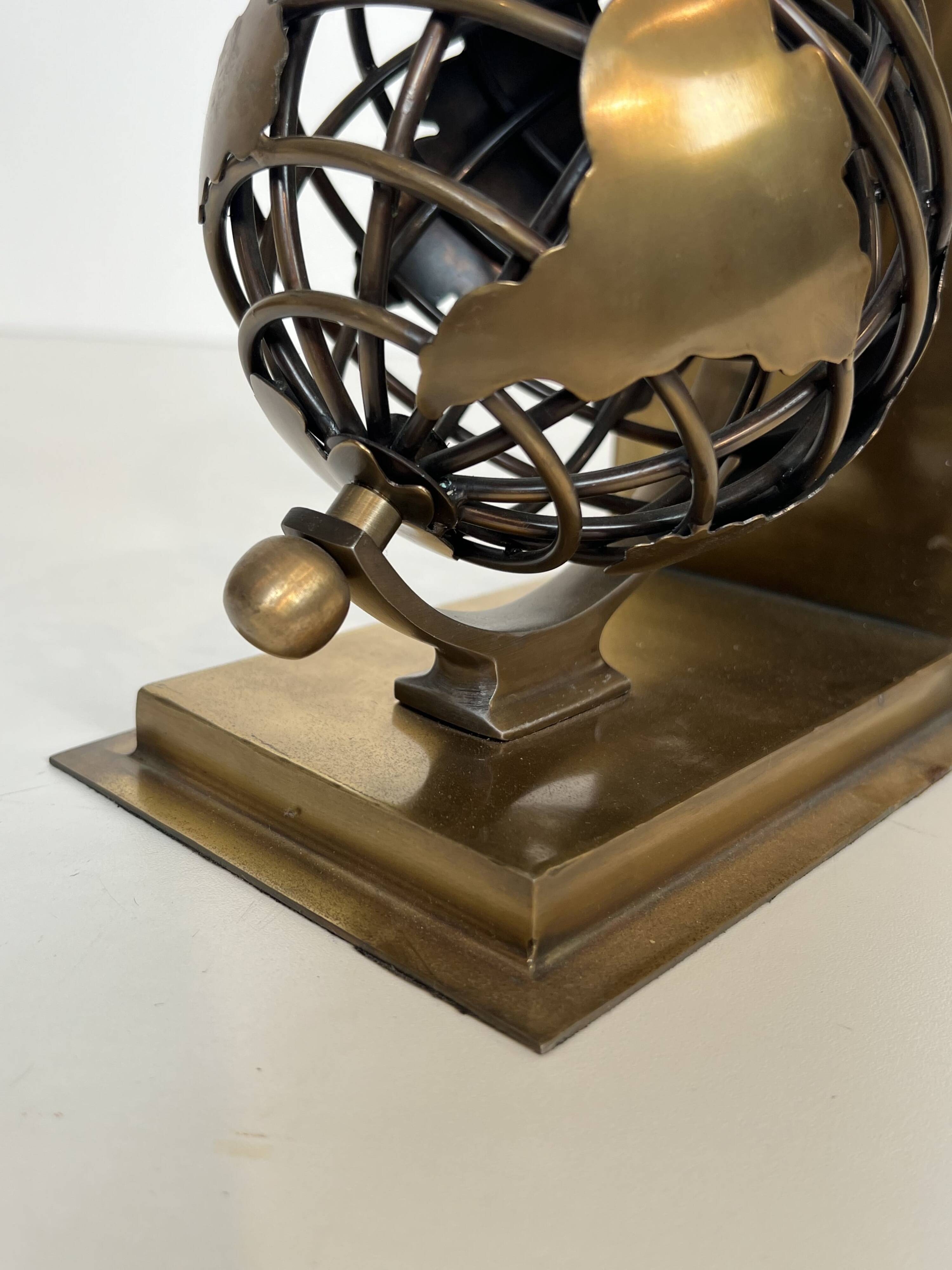 Pair of Brass Bookends with Openwork Globe Decorations. Work
