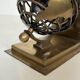 Pair of Brass Bookends with Openwork Globe Decorations. Work