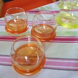6 Glasses with the name Culbuto in 3 orange colors and 3 lemon yellow colors