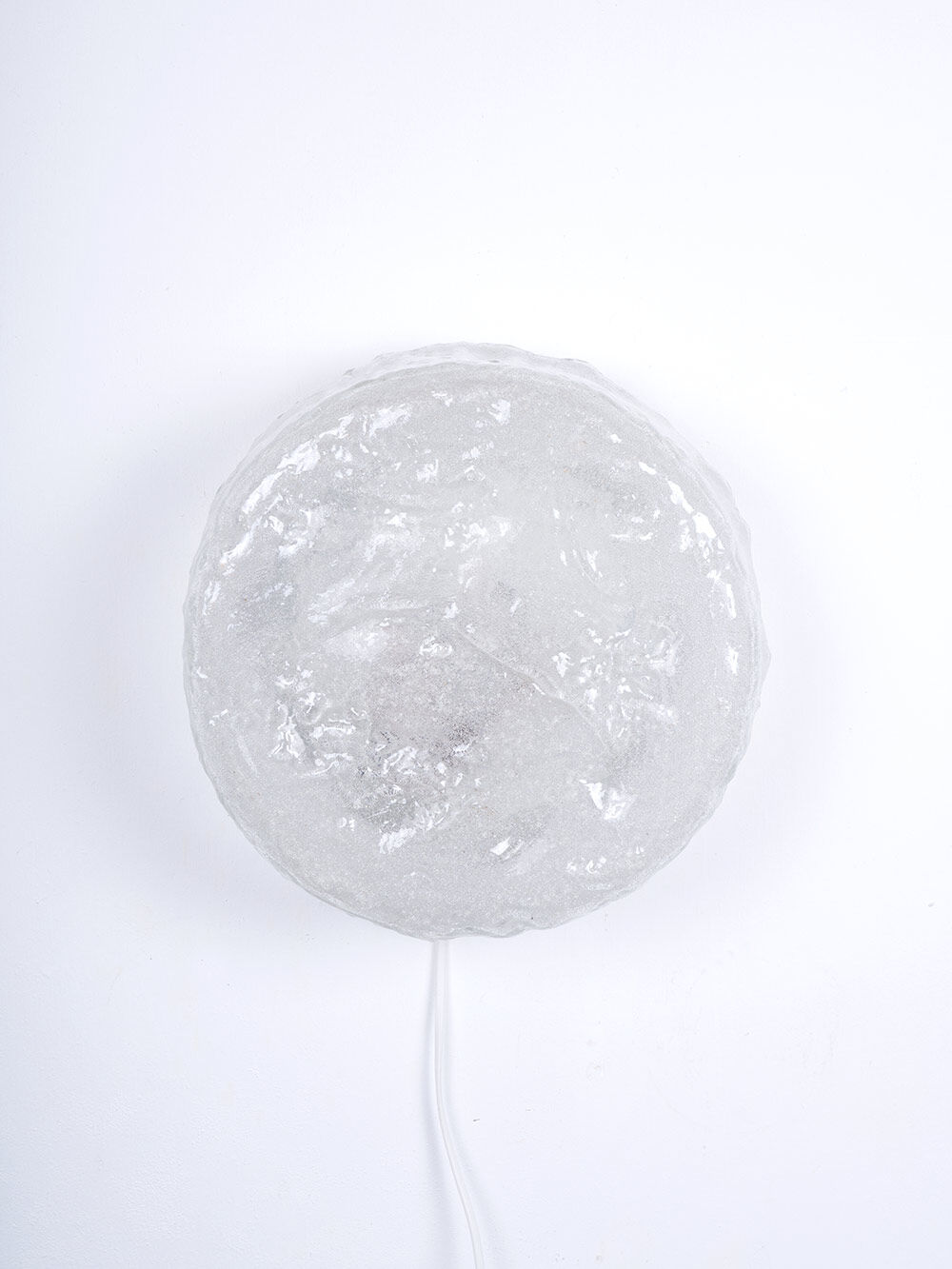 Wall or ceiling lamp made of ice glass
