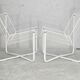 Paire de fauteuils tiges d'acier laqués blanc. Circa 1985