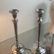 Pair of silver-plated metal candlesticks
