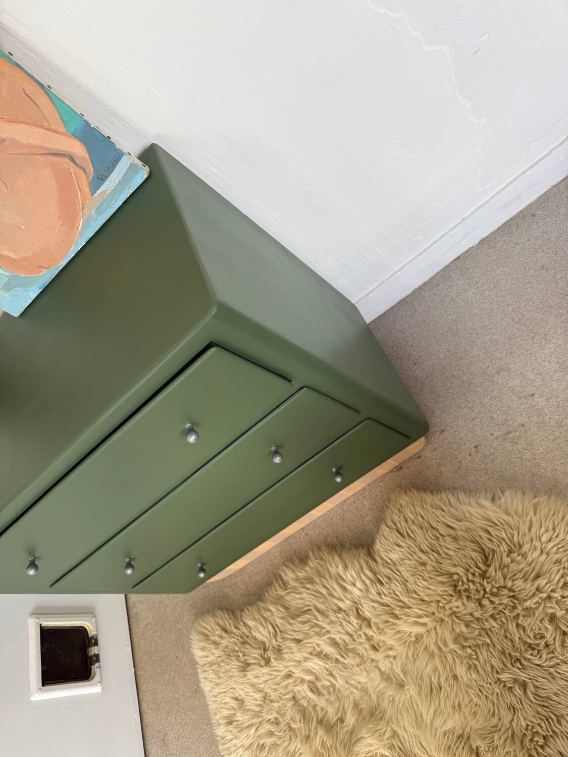 Vintage olive green chest of drawers with striped base