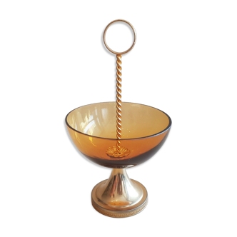 Servant candy display on yellow glass pedestal golden handle