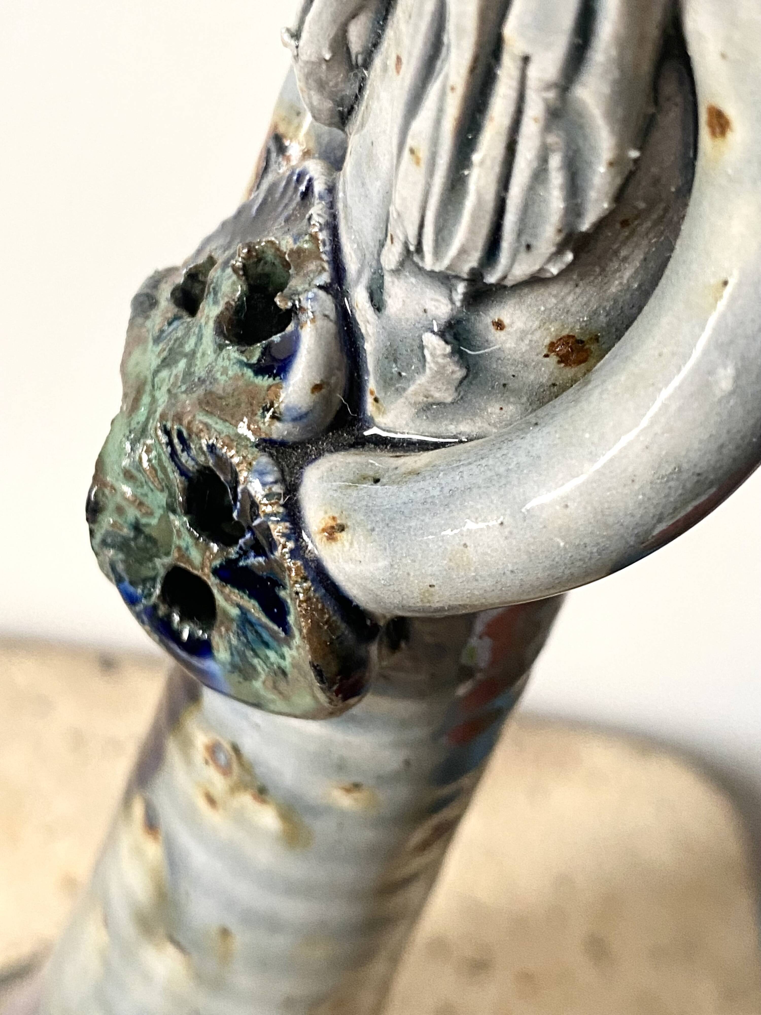 Anthropomorphic ceramic candlestick