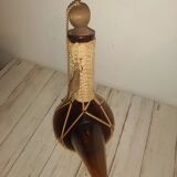 glass and wicker beak bottle