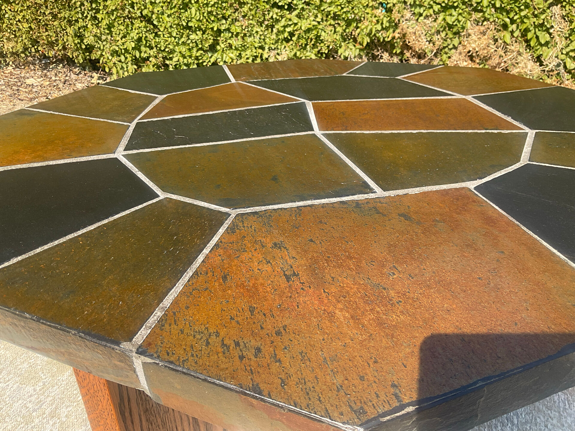 Brutalist octagonal coffee table from the 1970s in solid oak and slate.
