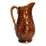 Brown pitcher with rose motifs