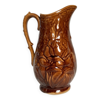 Brown pitcher with rose motifs