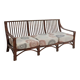 Vintage salon Maison Maugrion in rattan with leather and feather finishes.