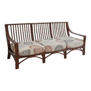 Vintage salon Maison Maugrion in rattan with leather and feather finishes.