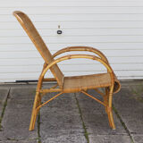 Rattan armchair with reclining backrest