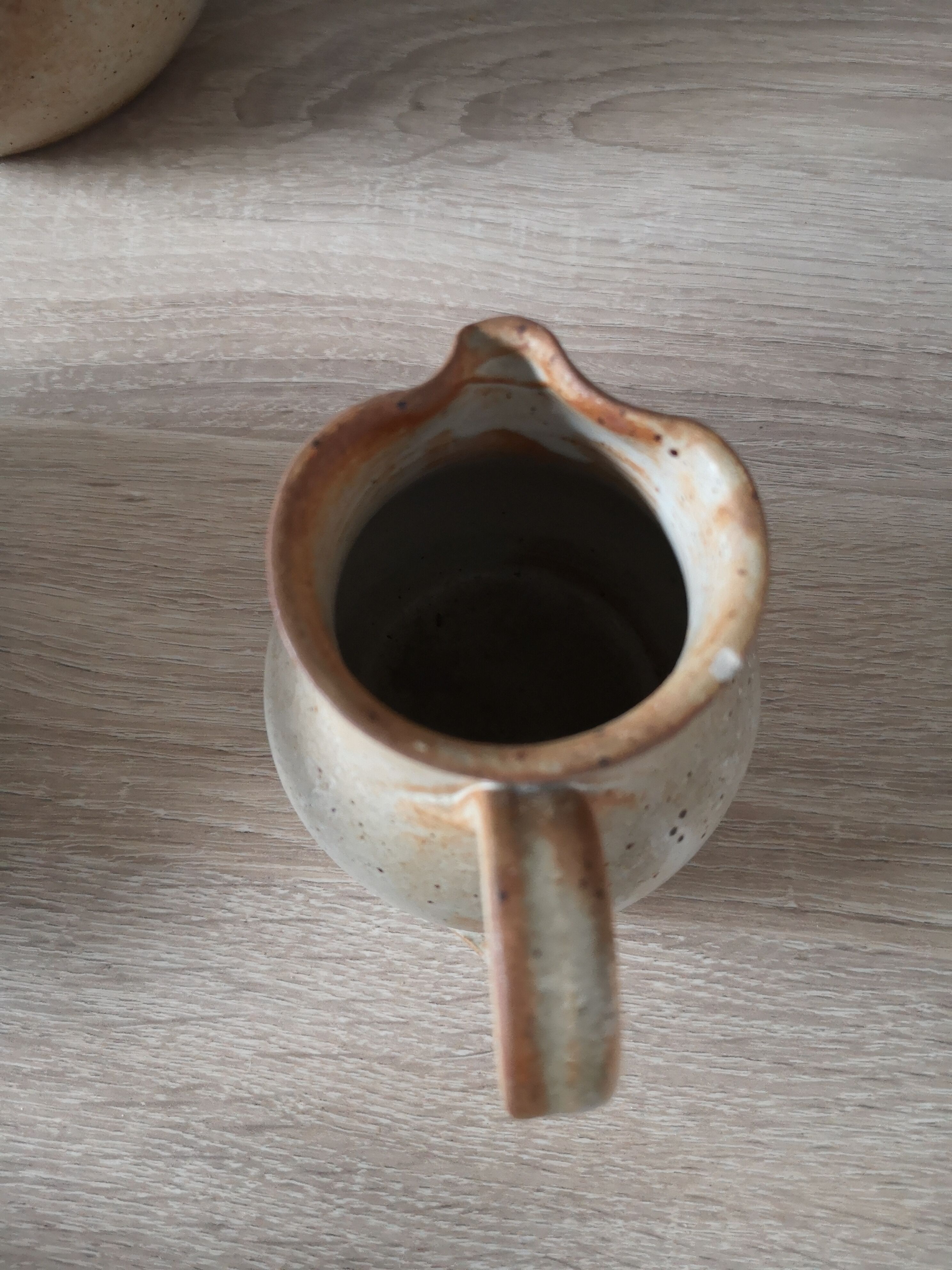 Lot of 4 pitchers in sandstone