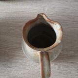 Lot of 4 pitchers in sandstone