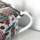 Chinese porcelain teapot flower characters