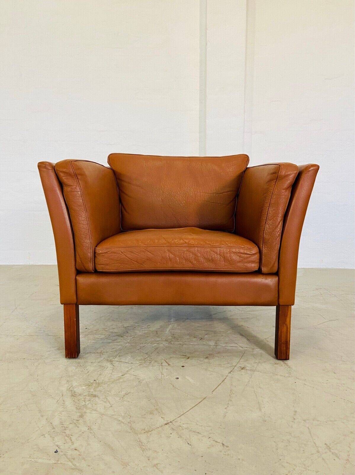 Fauteuil lounge scandinave vintage en cuir cognac, style milieu du siècle