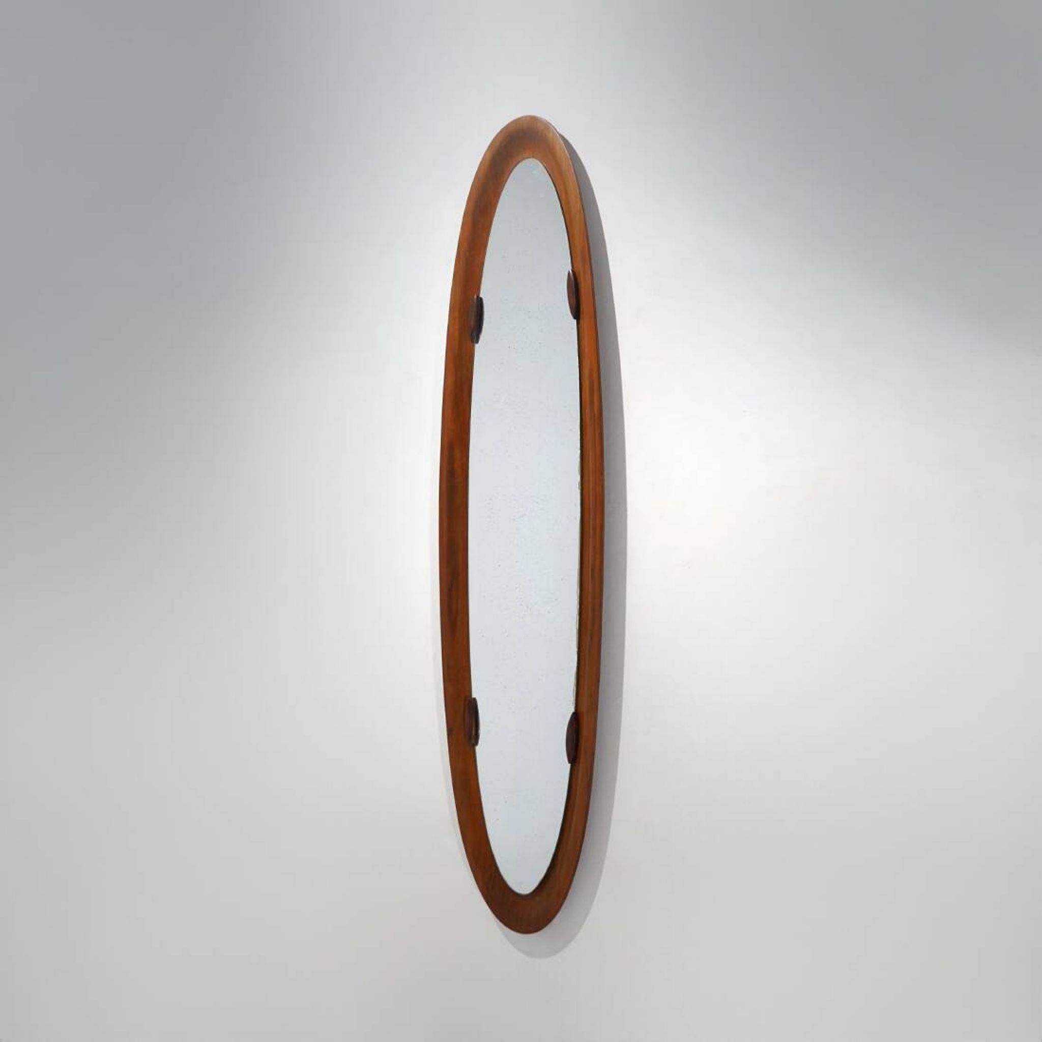 Curved plywood wall mirror, 1960s