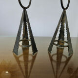 Pair of "brutalist" candlesticks in forged and hammered raw steel 70s