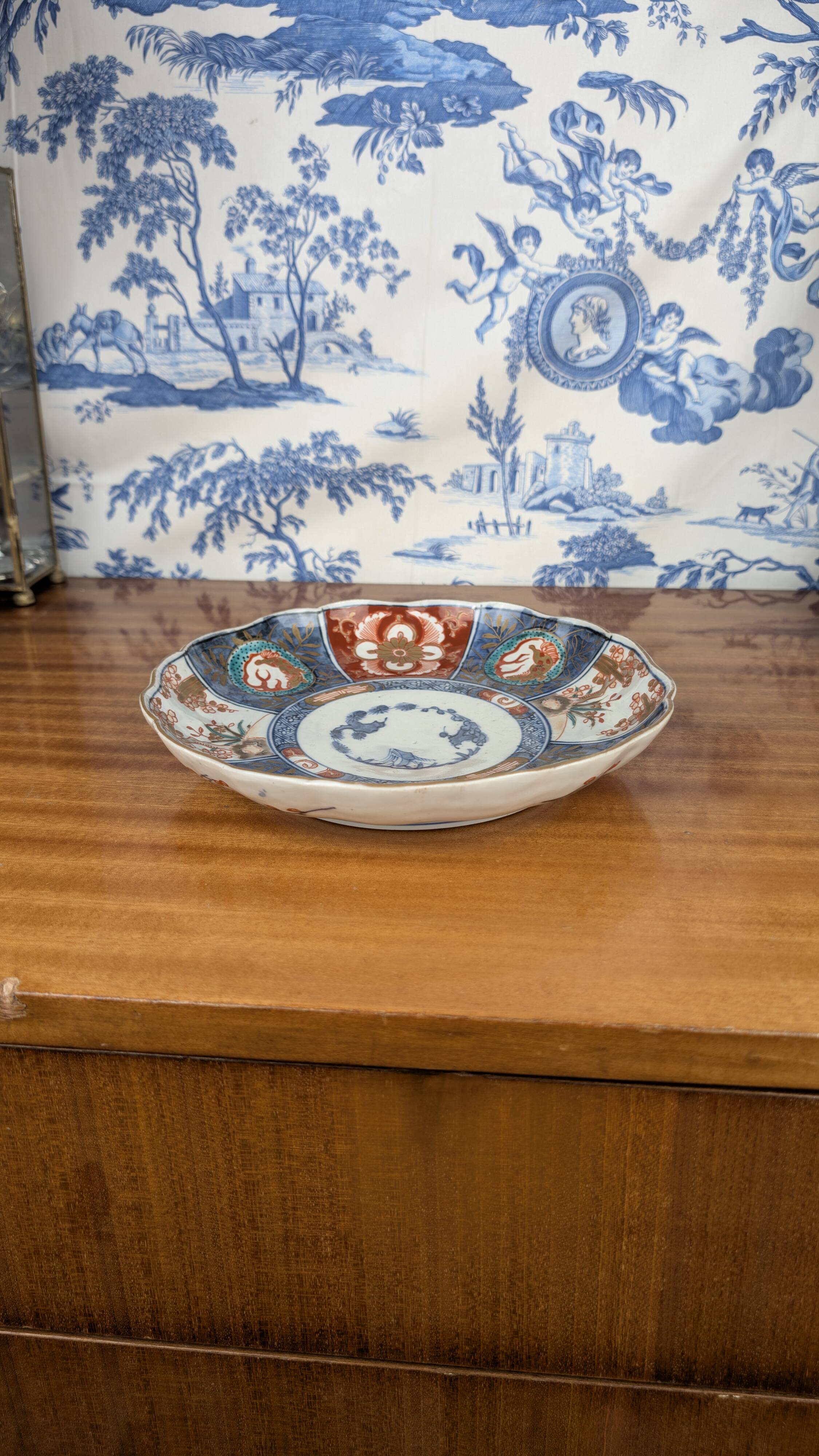 Signed Imari porcelain plate with Japanese lake and deer decoration, 19th century