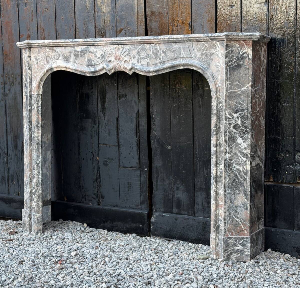 Regency-style fireplace in grey Ardennes marble from around 1900.