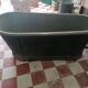 old bathtub with its stove