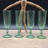 Set of 4 green Luminarc flutes