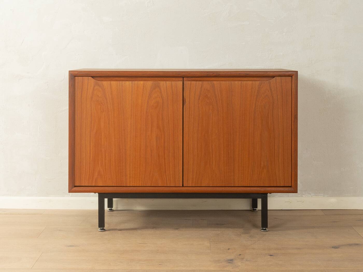 Classic chest of drawers from the 1960s with practical, closed storage space