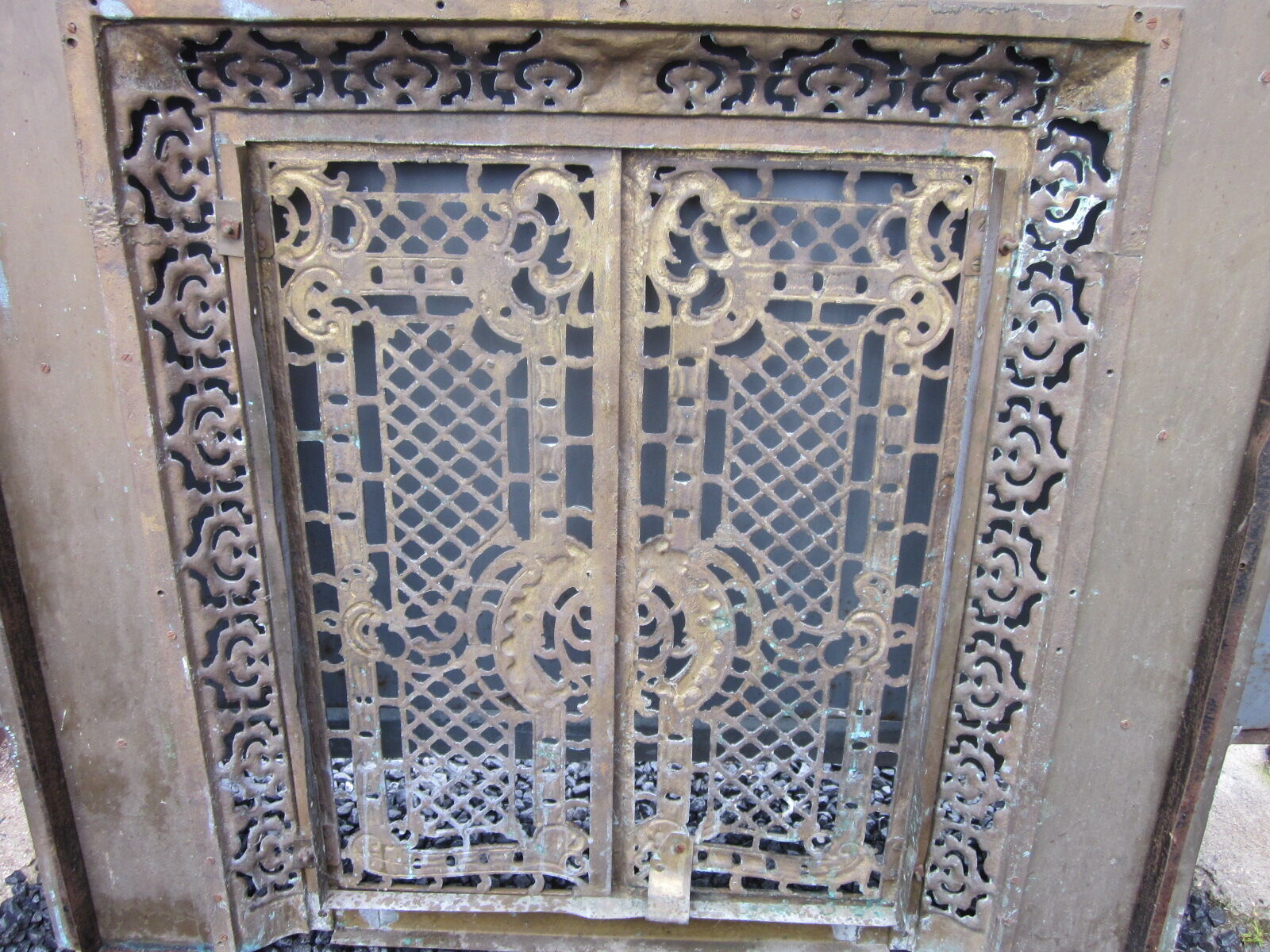 Front of the old fireplace all in bronze