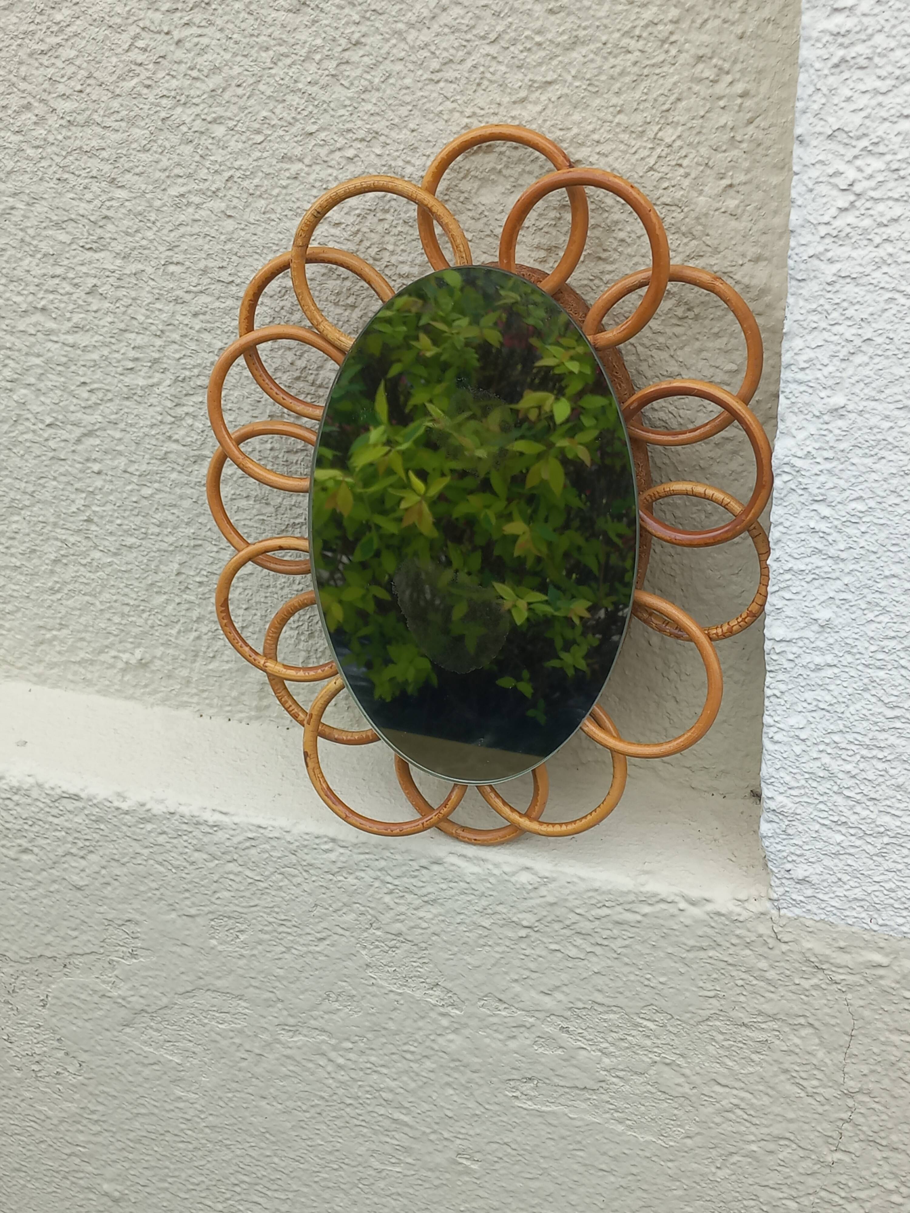 Miroir soleil ovale en rotin des années 70 25x31cm