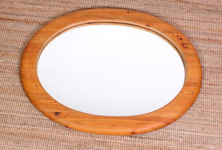 Mid-century oval mirror in solid pine Sweden 1960s 120x95cm