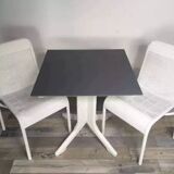 White woven resin garden chair