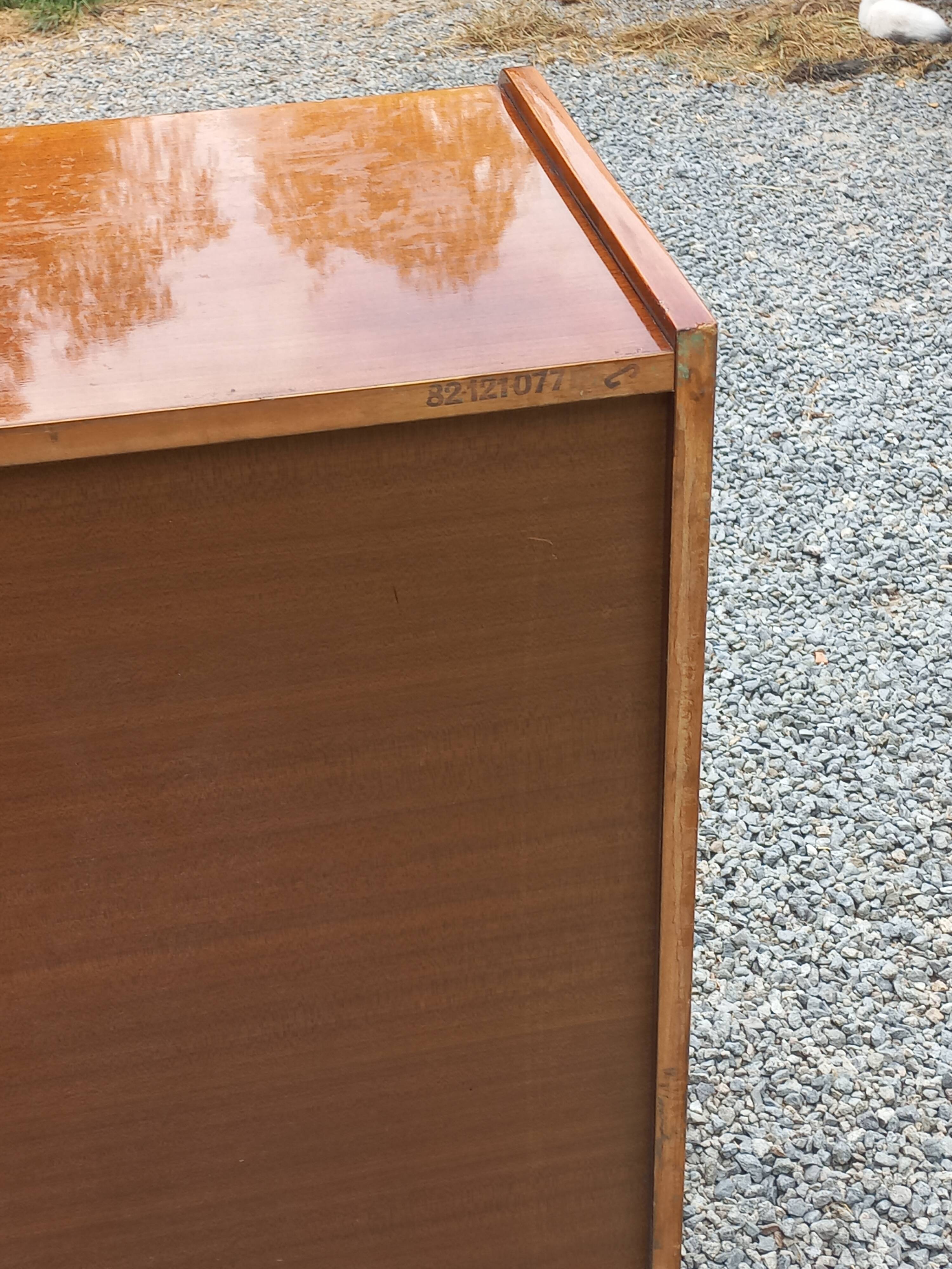 Vintage walnut varnished chest of drawers with 4 drawers from the 1960s.